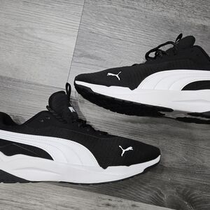 PUMA Zip C sneakers in black and white